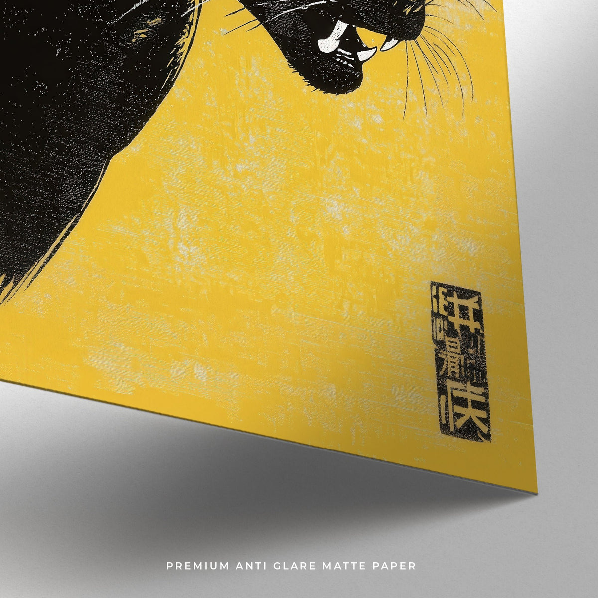 Detail close-up of panther wall art showing minimalist illustration on yellow matte paper with black panther and script