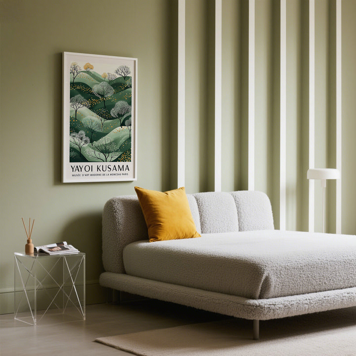 Green and Gold Wall Art of stylised trees on hills framed and hung on a sage wall above a sofa with a mustard cushion