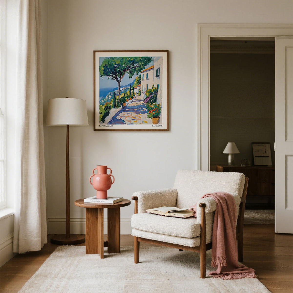 Prints of Amalfi Coast framed print of a Mediterranean path with trees and houses in a neutral living room with a floor lamp