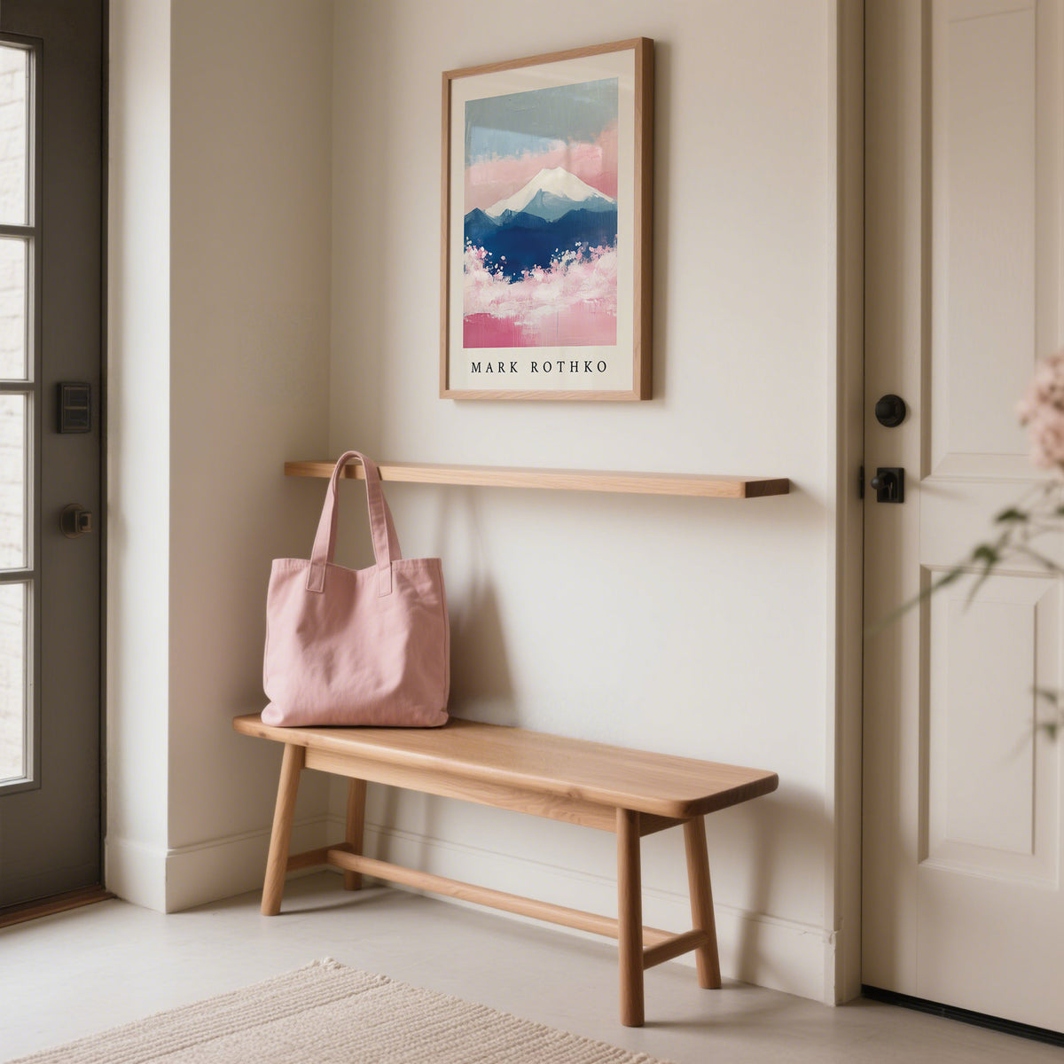 Mount Fuji Art print with abstract watercolour snow-capped mountain above a wooden bench and pink bag in a hallway