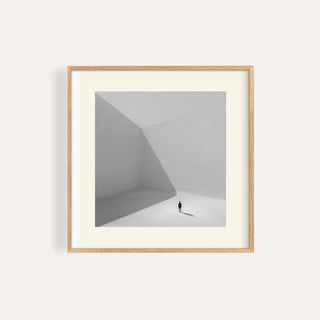 Square Art Prints showing a minimalist photographic art of a lonely man in grey tones