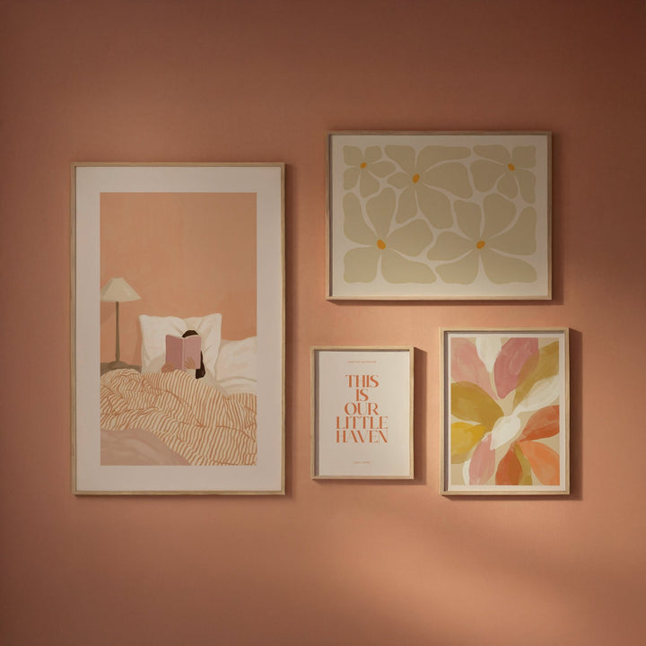 4-Piece Floral Wall Art Set on a muted pink wall with mostly beige and earth tones