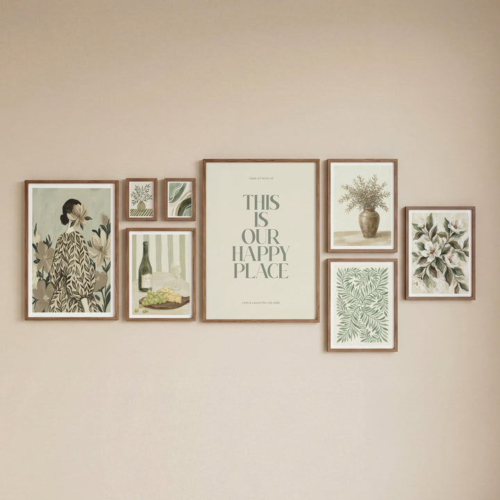 Dining room gallery set with botanical illustrations and typography in muted green and beige tones on a beige wall