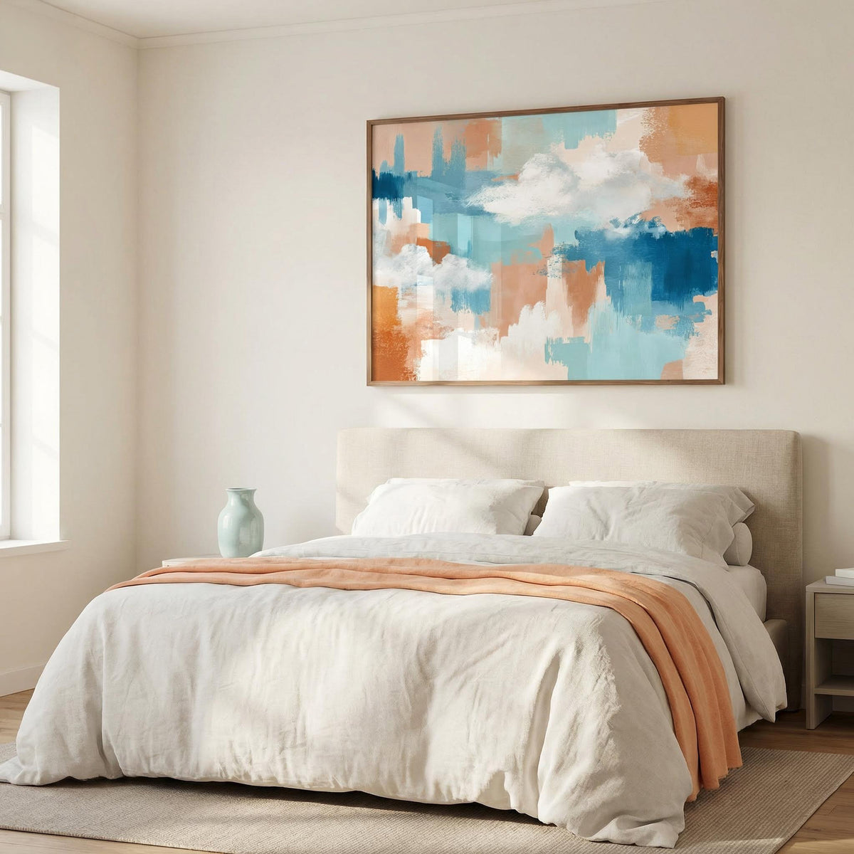Abstract Cloud Print hanging above a bed with a turquoise vase on the side table