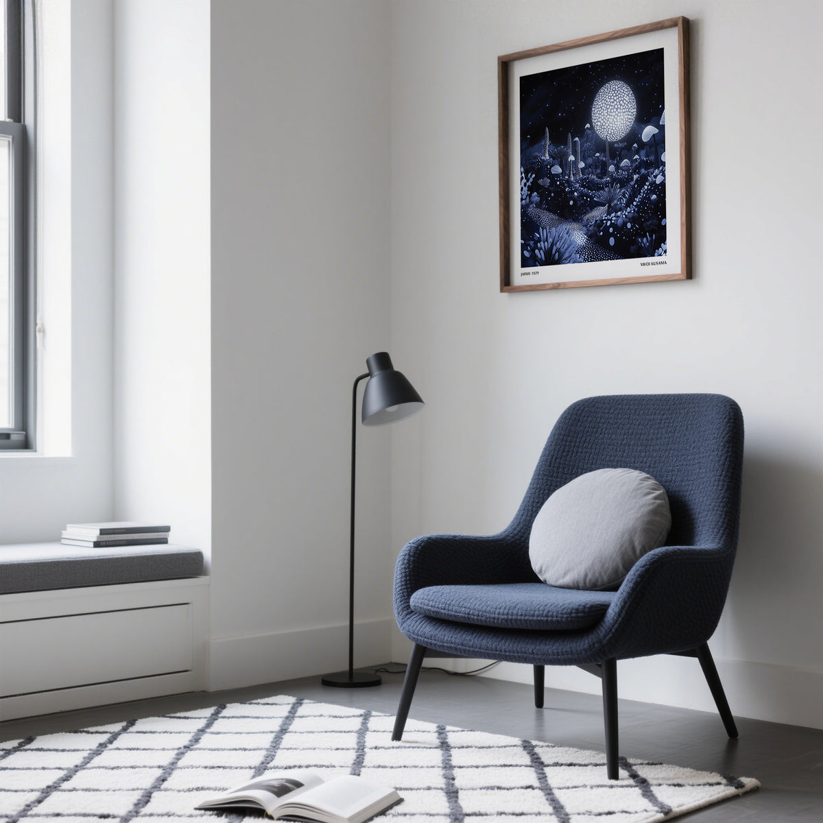 Wall Art Night Sky framed print of glowing surreal mushrooms in blue and black hung above a navy armchair in a sitting room