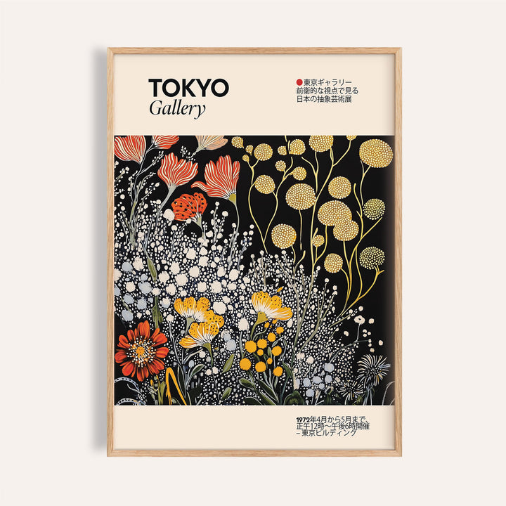 Vintage Japanese wall art with stylised flowers in yellow, red and white on a black background