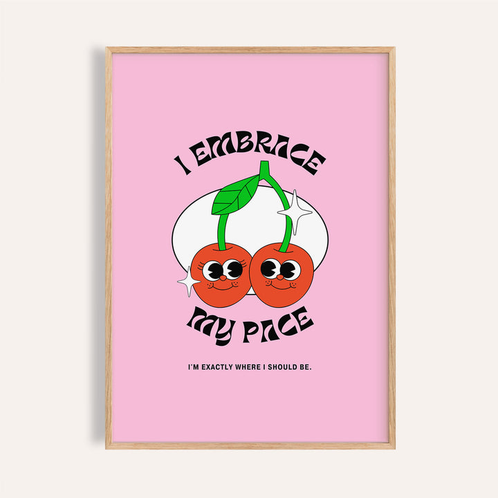 Framed wall art for dorm with a pair of cherries on a pink background