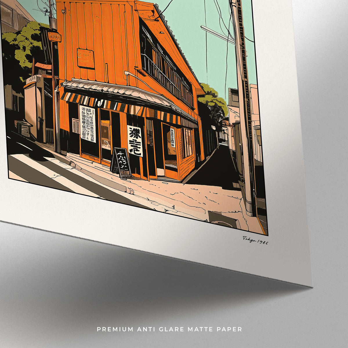 Detail close-up of Tokyo wall art showing orange street building with Japanese signs