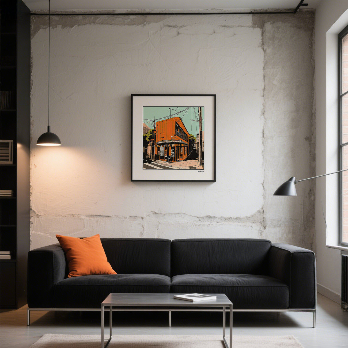 Print of Tokyo Wall Art with an orange street building in a modern living room above a black sofa with an orange cushion
