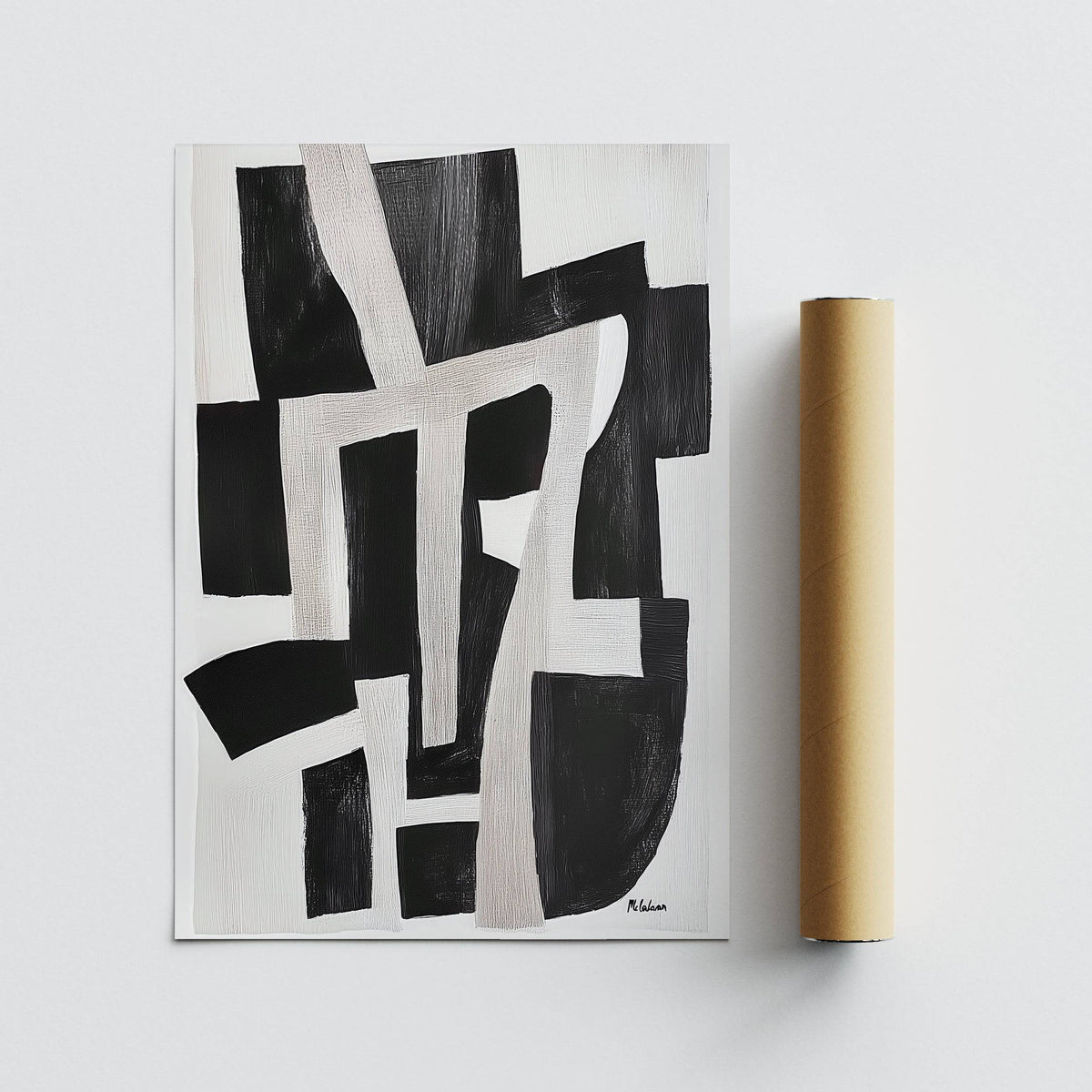 Wabi Sabi home decor abstract black and white shapes alongside a brown packaging tube
