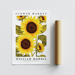 Sunflower wall art print with bright yellow flowers and green leaves beside a brown packaging tube