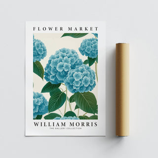 Flower Market Prints lying flat showing blue hydrangea flowers next to a brown packaging tube