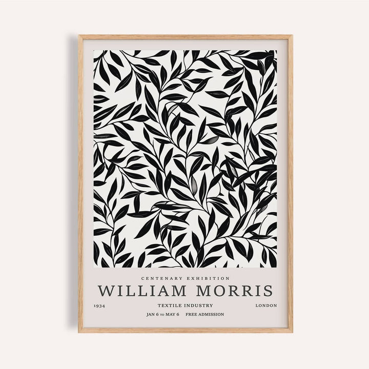 Black and White Vintage Wall Art framed print close-up with black leaf branches and text in beige background
