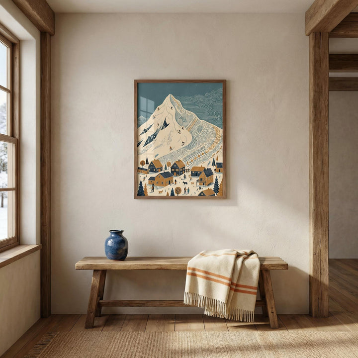 Winter Mountain Art Print hanging above a wooden bench with a folded blanket and a blue vase