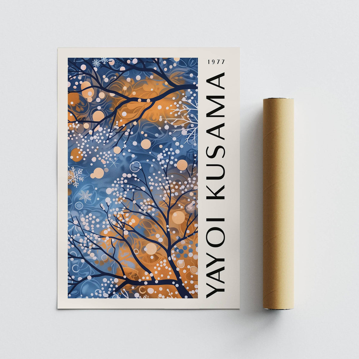 Starry Trees print with abstract tree branches in blue and orange next to a packaging tube