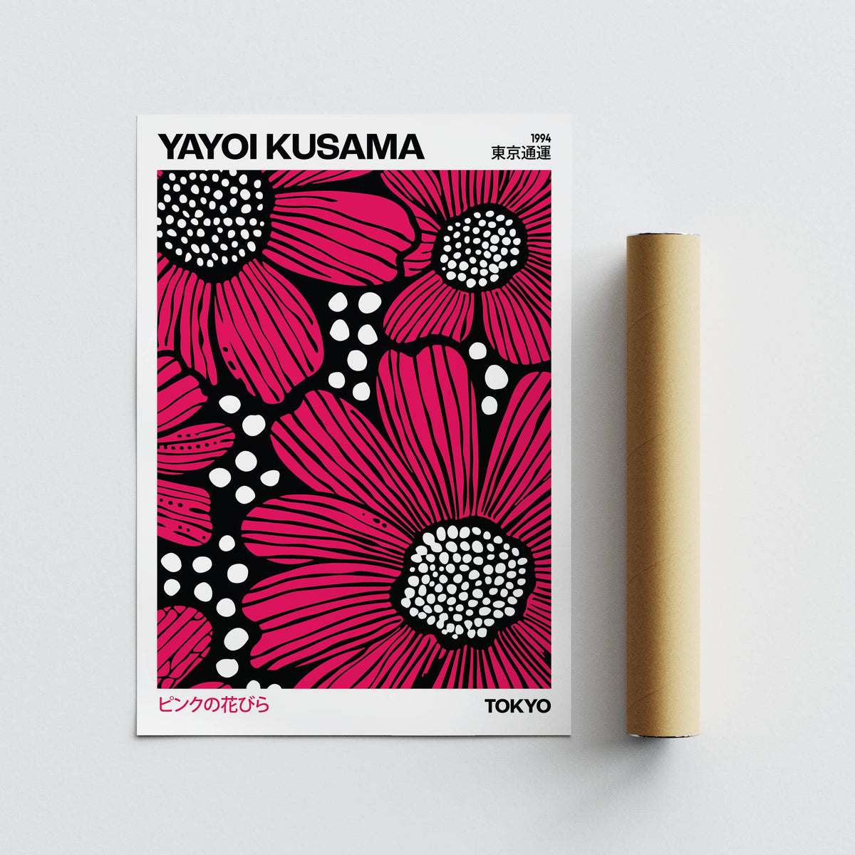 Pink Posters print of red daisies next to a brown packaging tube on a white surface