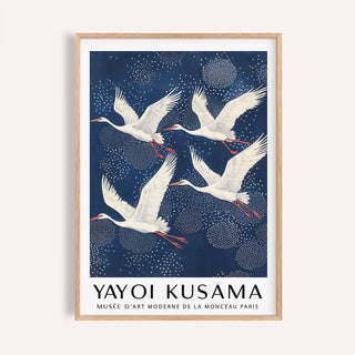 Blue and White Prints showing flying red-crowned cranes in a japanese-ink style with navy blue background
