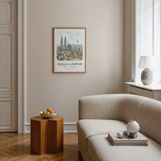Print on a wall in a neutral living room showing the Kuala Lumpur Art Print with soft blues and greens