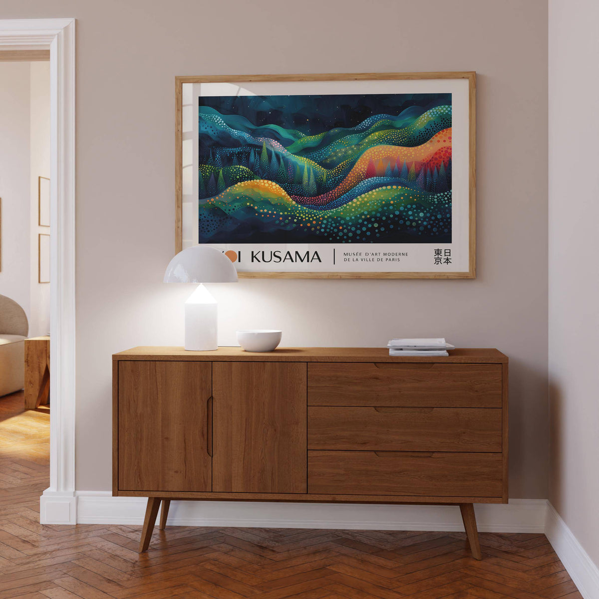 Horizontal Abstract Art framed print of colourful abstract waves above a wood sideboard with a white lamp