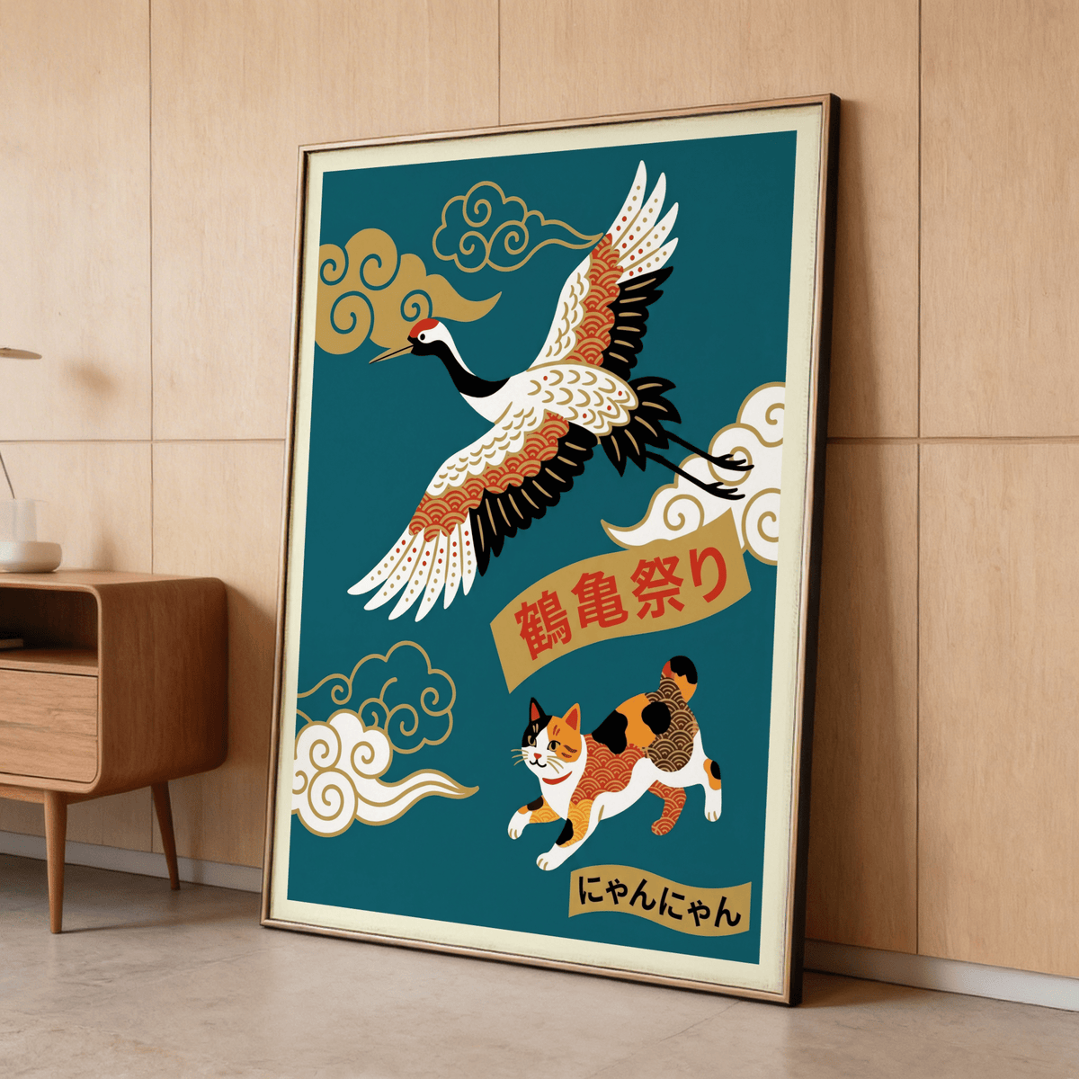 Calico Cat Poster print leaning on a wooden floor showing a flying crane and calico cat with Japanese-ink style in teal and beige