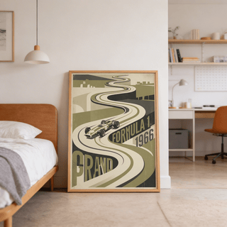 Print leaning on a floor of vintage Grand Prix Car Poster in retro green and beige tones near a bed