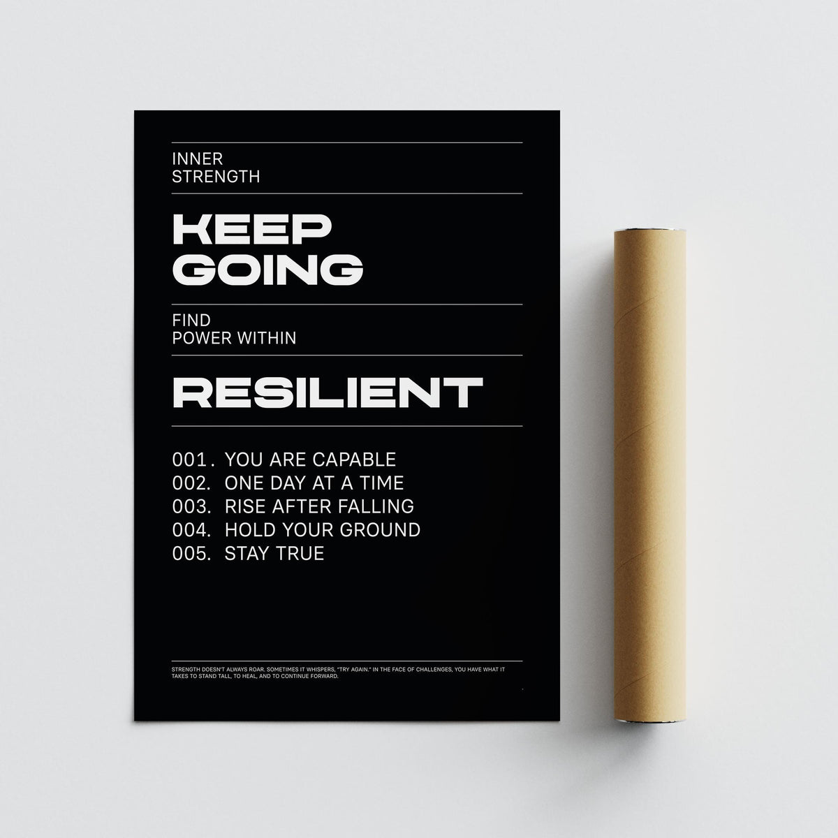 Work Hard wall art with motivational text in white on black beside a brown packaging tube