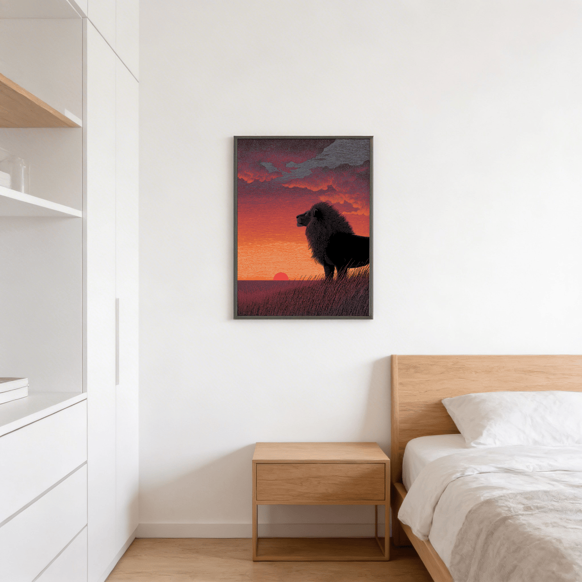 Majestic Lion Art Print framed on a bedroom wall above a wooden bedside table with white bed linens
