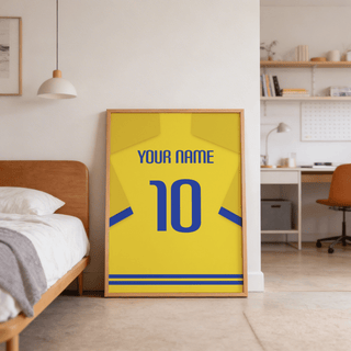Football Shirt Poster in Yellow with Blue Trim leaning on a bedroom floor near bed and shelving