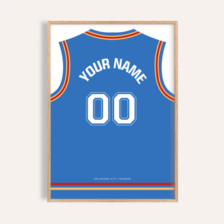 Framed basketball jersey poster in blue with red and yellow trim in a light wooden frame