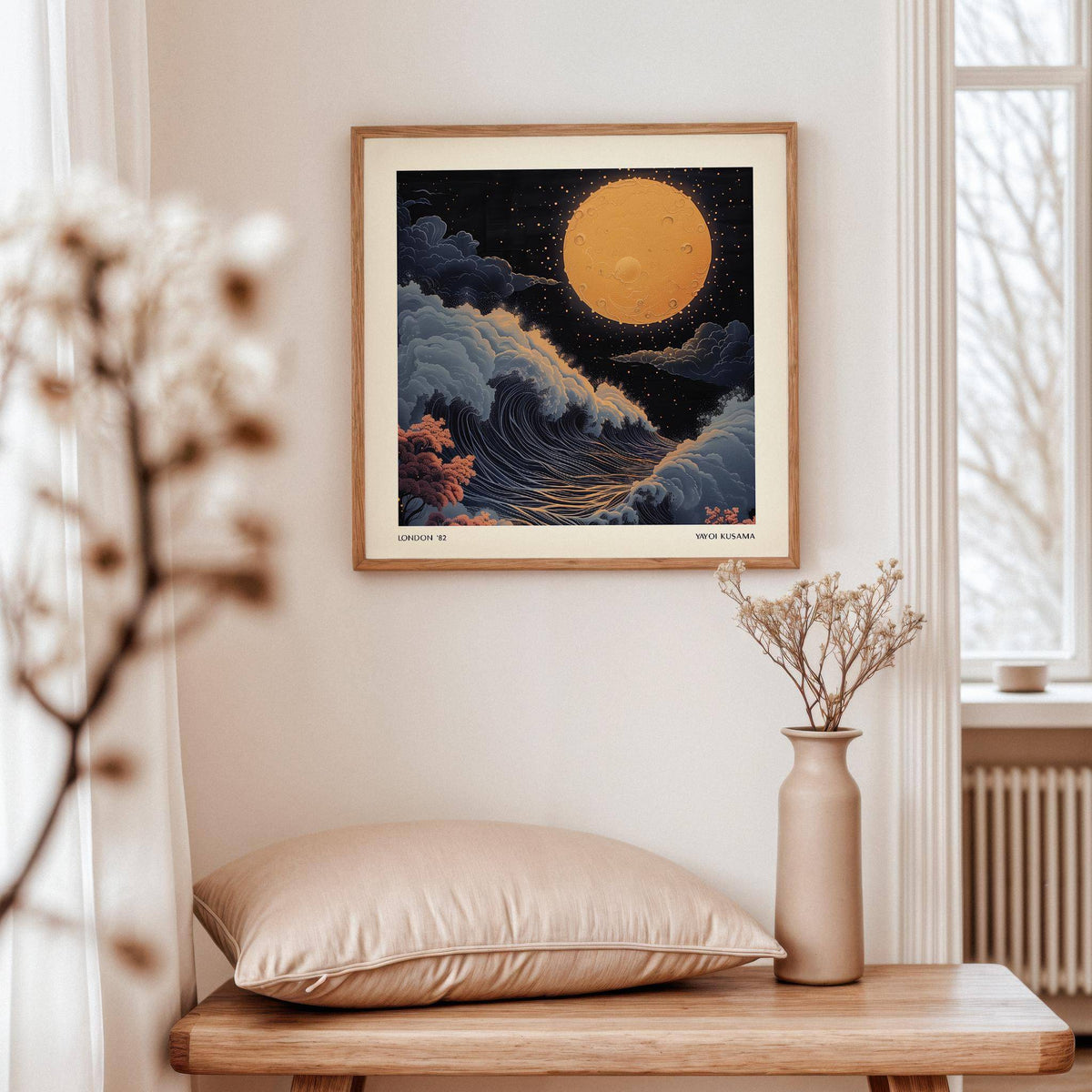 Japanese Art Pictures wall art of a surreal full moon above rolling waves with soft pastel clouds in a neutral room with a vase