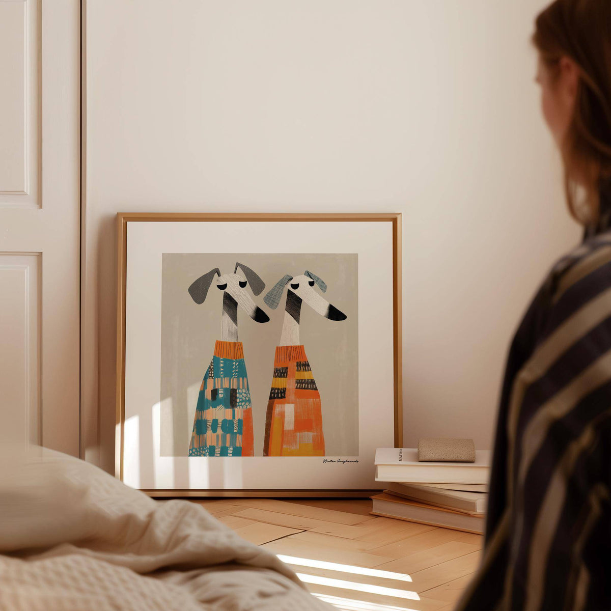 Wall Art Dog leaning on a floor near a stack of books with natural light on the print