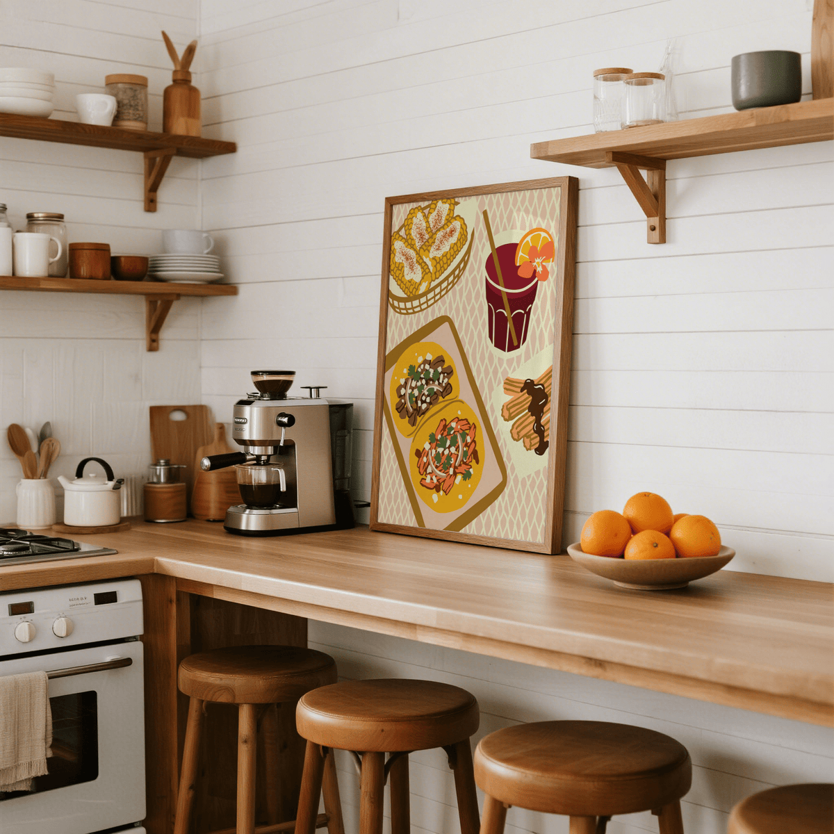 Mexican Food Art Print leaning on a kitchen counter with stools and bowl of oranges nearby