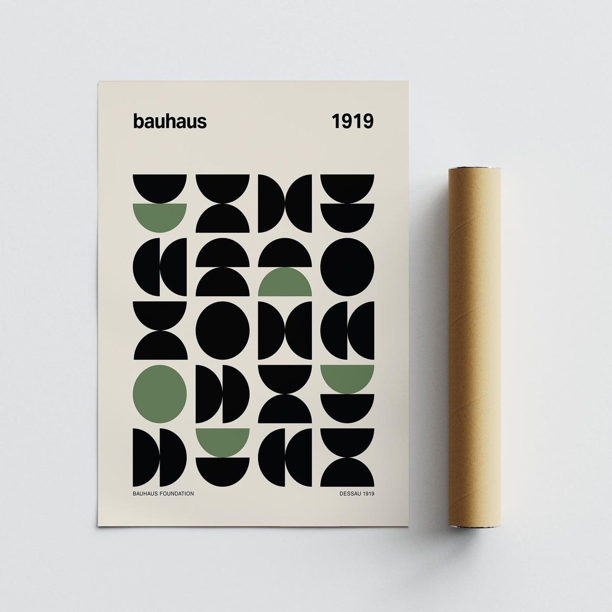 Gallery Print of geometric shapes in black and muted green alongside a packaging tube on a white background