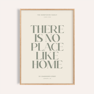 No Place Like Home Print with green typography on a cream background in a wooden frame