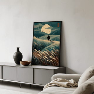 Japanese Landscape Art print leaning on a grey cabinet with a dark vase and wooden bowl nearby