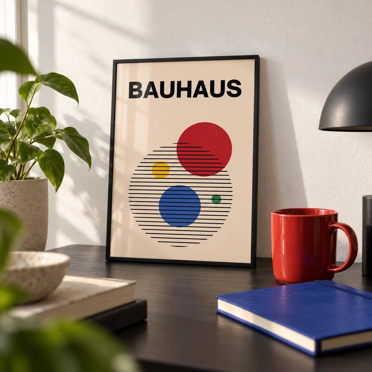 Abstract Circle Wall Art, a small A4 framed print leaning on a black desk