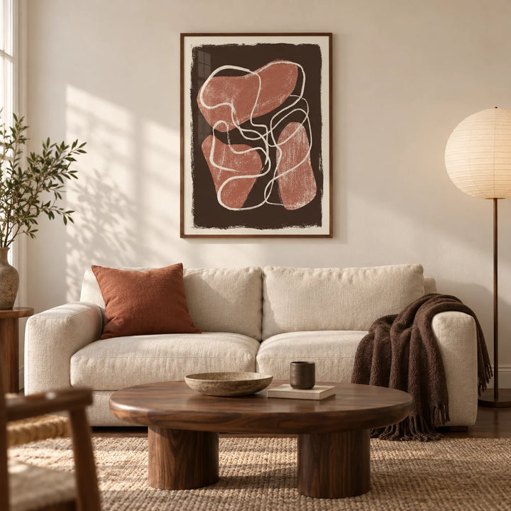 Abstract Earth Tone Print, framed on the wall of a warm contemporary living room in a UK city flat with ivory walls and a walnut floor