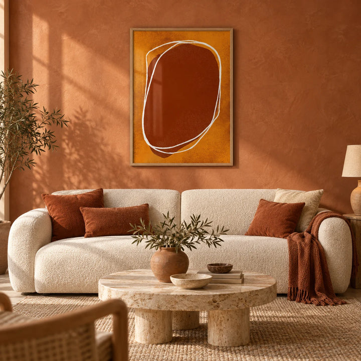 Abstract Earth Tone Wall Art, framed on the wall of a warm earthy living room with a terracotta limewashed wall