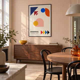 Abstract Geometric Art, framed on the wall of a modern dining room in a renovated UK terrace with a pale peach wall and pale timber flooring