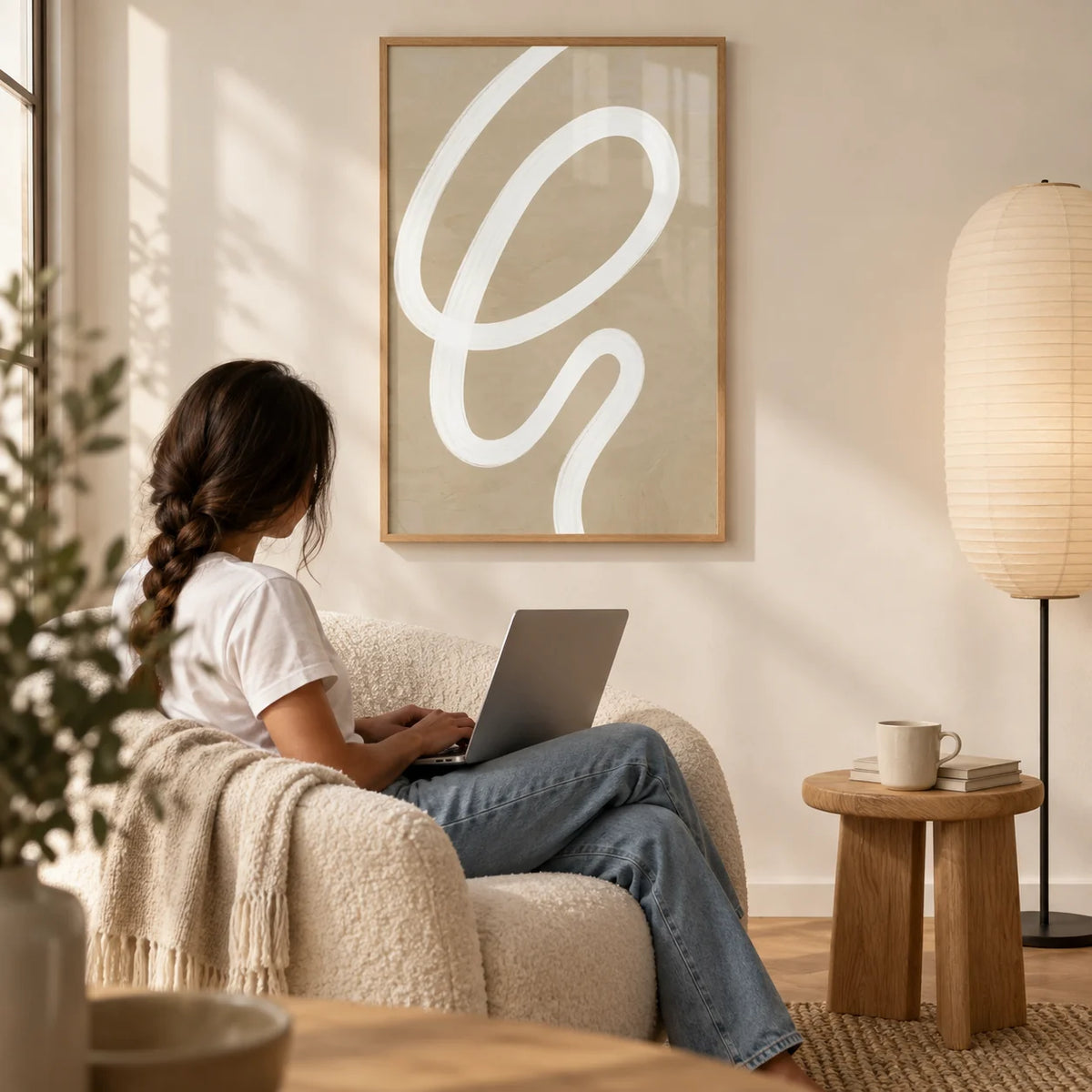 Abstract Painting Minimalist, framed on the wall of a quiet reading corner with a warm white wall in a living room