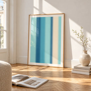 Abstract Stripe Print, framed and leaning on the parquet floor of a bright living room