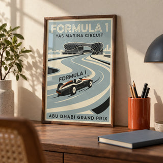Abu Dhabi Race Circuit Poster, a small A4 framed print leaning on a walnut desk