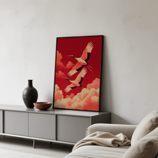 Flying Cranes wall art leaning on shelf with black vase and wooden bowl in a neutral living room
