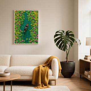 Colorful Water Lily Poster print on a living room wall with green leaves and pink flowers next to a large potted plant