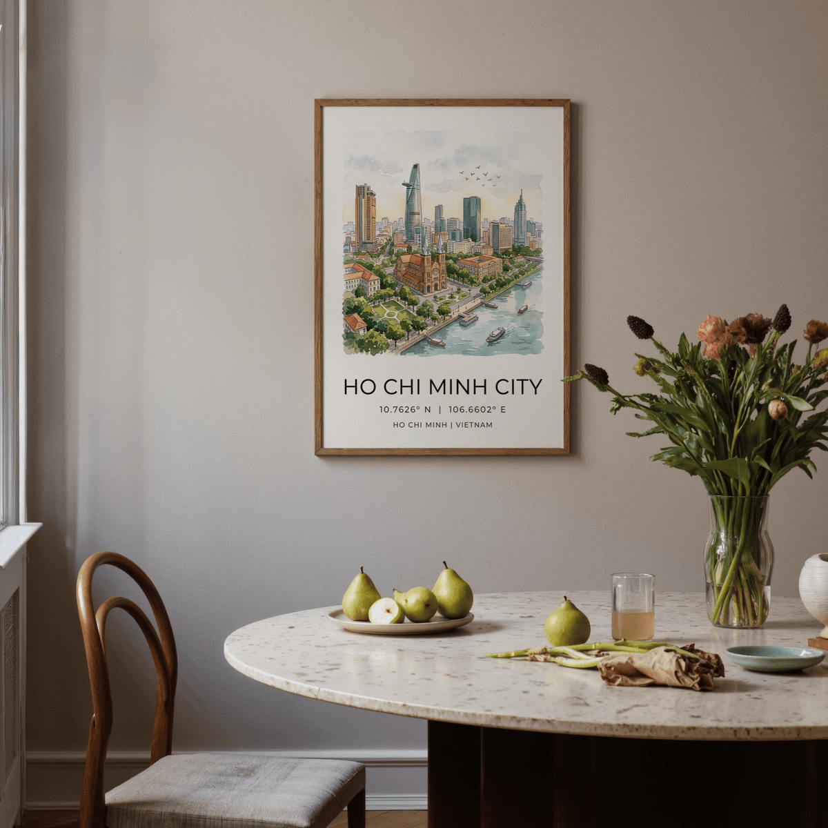 Ho Chi Minh City wall art of a watercolor skyline illustration in a dining room with pears on the table