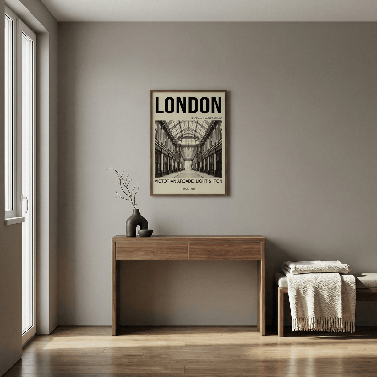 Victorian London Art Print framed on a grey wall above a wooden console with a vase in a bright hallway