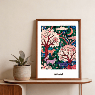 Framed Sakura Spirit wall art showing foxes among pink sakura blossoms in vibrant colours