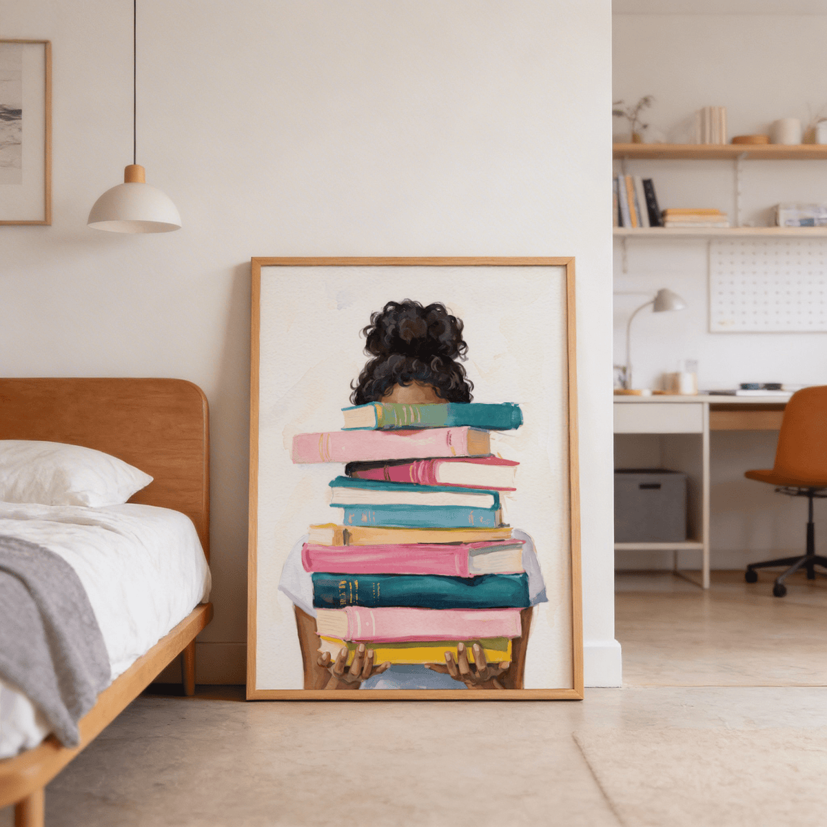 Print leaning with book lover art print of a person holding a stack of colourful books next to a wooden bed