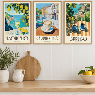 Amalfi Coast Prints Set of 3 hung at eye level above a wooden kitchen worktop: Amalfi Limoncello, Morning Piazza and Amalfi Espresso shown framed side by side (frames not included)