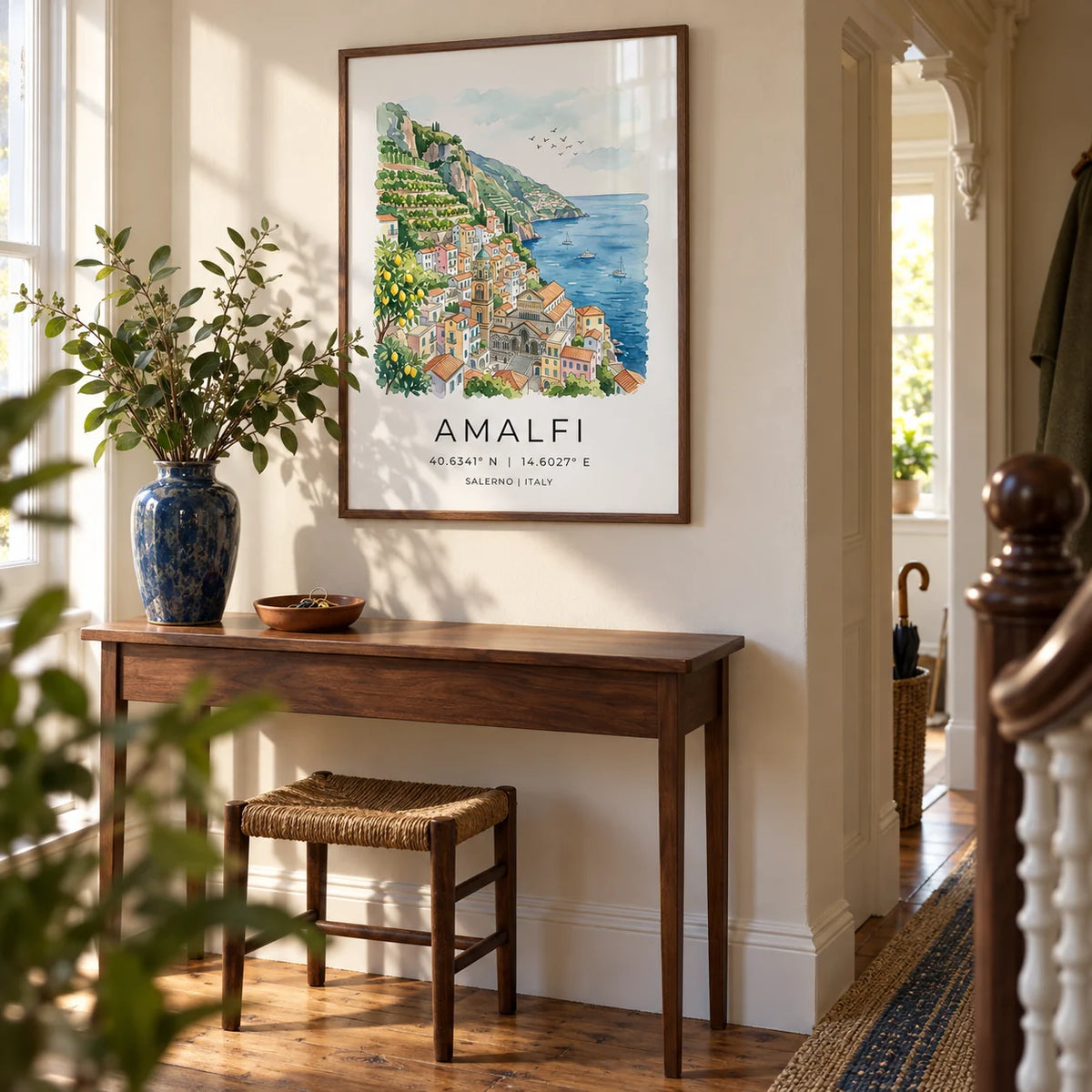 Amalfi Coast Wall Art, framed on the wall of a welcoming hallway in a Victorian terrace with warm ivory walls and restored wooden floorboards